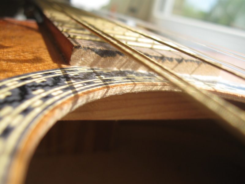 กีต้าร์โปร่งไม้Laminate กับ ไม้Solid แตกต่างกันอย่างไร